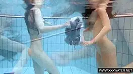 I watch shaved brunette with big tits bathing in shower