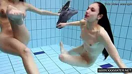 I watch shaved brunette with big tits bathing in shower