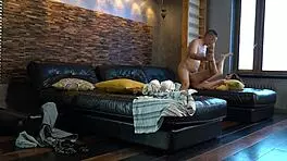 Amateur step dad fucks young brunette on black sofa.