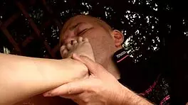 she's deflorating this teen with her fingers and mouth