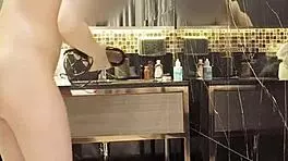 Dry Hair After Bathing of Japanese Slender Beauty in Shower