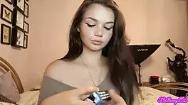 XO Bunny blows smoke in your face while smoking her cigarette.