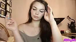 XO Bunny blows smoke in your face while smoking her cigarette.