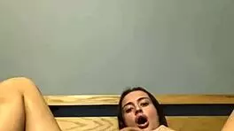 The slutty goth 19-year-old engages in solo anal play in her room