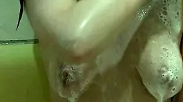 beautiful girl takes soapy bath, foam on her wet pussy 😍