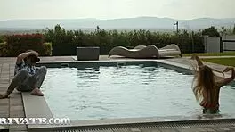 Blonde model Eveline Dellai enjoys anal sex with big cock by the pool in outdoor creampie scene