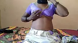 Girl Inserts Vibrator Into Her Pussy On Bed.