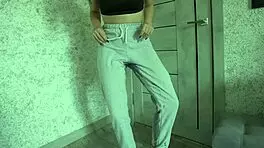 Petite teen experiences desperation pee in homemade video