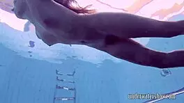 Lucy says, 'Watch me take off this bikini in the pool.'