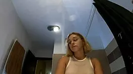 super hot petite 18+ blonde cheerleader wears a short miniskirt with a see through top to show her tits and flash pussy under her short skirt