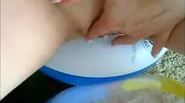 Sophie wears jeans and miniskirt while on webcam.