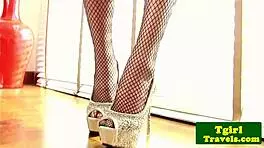 Ladyboy Ning in corset says, 'Look at my tight ass ready for assfucking.'