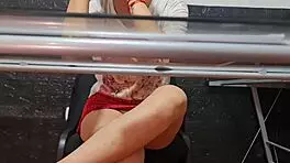 The risky spy camera captures beautiful secretary Nataly in upskirt shots at the university faculty.