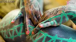 Tattoo girl feels pleasure in solo anal play with big dildo in sexy fishnets