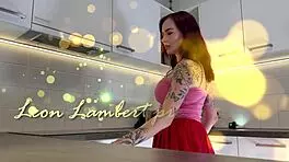 Hottest Redhead Tattooed Cheerleader With Over Knee Socks Shows Her See Through Panties In The Kitchen