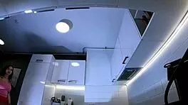 Hottest Redhead Tattooed Cheerleader With Over Knee Socks Shows Her See Through Panties In The Kitchen