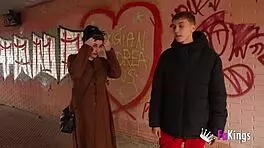 Emmita Smile flashes her huge tits to seduce that young guy in public.