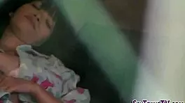 Hidden cam spies on asian teen in private moment