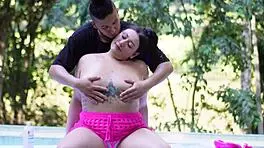 Massage therapist induces public squirting with magic fingers.