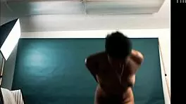 Exotic hottie spreads pussy for photographer