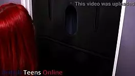 Redhead nurse sucks cock at gloryhole