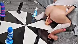 Petite girl wins orgasm playing wheel of dildos