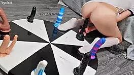 Petite girl wins orgasm playing wheel of dildos