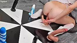 Petite girl wins orgasm playing wheel of dildos