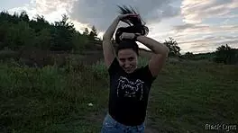 Black Lynn ties her long black hair into a ponytail and demonstrates her cock sucking skills in this narrative scene