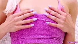 radiant blonde girl casually shows off her sexy body in a photoshoot