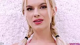 radiant blonde girl casually shows off her sexy body in a photoshoot