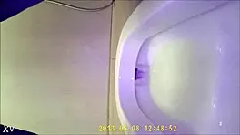 Asian Teen Pees in Toilet