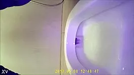 Asian Teen Pees in Toilet