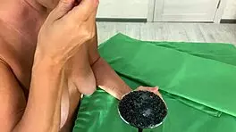 Tell me, how does this mature woman milk her partner's balls?