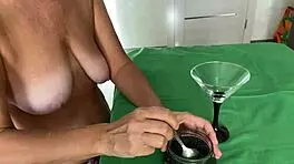 Tell me, how does this mature woman milk her partner's balls?