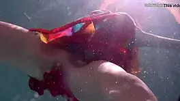 Redhead Nikita Vodorezova Takes A Quick Bath Underwater