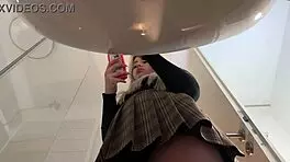 Hot blonde babe with big tits and ass strips in pantyhose and heels in bathroom