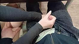 Jerked off classmate's cock during lecture!