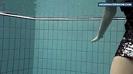 Flashing those bright tits underwater gets everyone so horny!