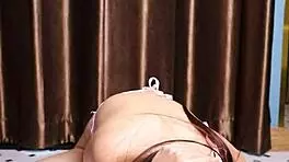 april maxima sucking a dildo before she gives it a footjob