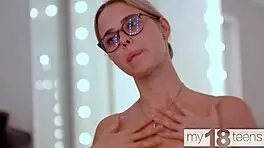 Stunning girl plays with her pink pussy!