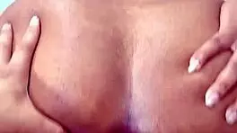 enjoy the view of this big-assed girl opening her ass while taking a cock in her anus