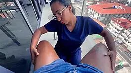 What passionate massage is the latina couple enjoying in homemade setting