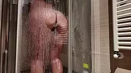 feeling so wet, big breasted milf shaves her hairy pussy in the shower