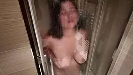 feeling so wet, big breasted milf shaves her hairy pussy in the shower