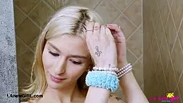 Picture-Perfect Blonde Enjoys Relaxing Shower