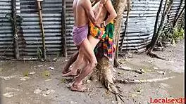 raini enjoys outdoor sex with her bengali boudi friend in the country ranch during a webcam session