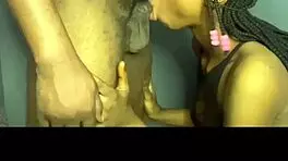 the petite black girl casually gives a good blowjob with spitting