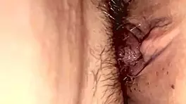 Amateur Asian wife licks wet shaved pussy close-up