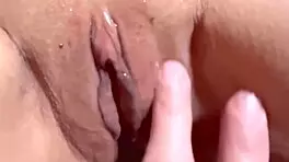 Amateur Asian wife licks wet shaved pussy close-up